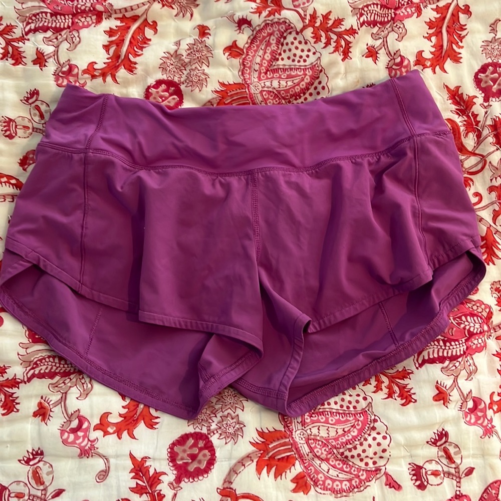 Size 4 2.5 inch Lululemon speed ups. Great condition No stains PLUM COLOR